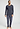 Full-body view of a men model wearing HA stormy gray cotton L/SLV Henley Shirt