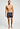 Full-body view of a men model wearing HA checked blue cotton Boxers