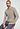 Close-up view of a men model wearing HA wooly beige cotton L/SLV Shirt