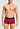 Front view of a men model wearing HA intense red microfibre Pants