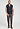 Full-body view of a men model wearing HA deep navy cotton Zippered vest