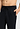 Close-up view of a men model wearing HA black cotton Long Pants