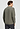 Back view of a men model wearing HA smokey olive cotton Pullover