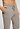 Close-up view of a men model wearing HA toffee melange modal/viscose/tencel Long Pants