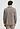 Back view of a men model wearing HA earthy woven cotton Shirt 1/1 Arm