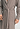 Close-up view of a men model wearing HA earthy woven cotton Robe