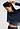 Close-up view of a women model wearing HA deep navy modal/viscose/tencel L/SLV Pajama