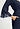Close-up view of a women model wearing HA deep navy modal/viscose/tencel Robe 110cm