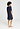 Back view of a women model wearing HA deep navy modal/viscose/tencel S/SLV Nightdress 95cm