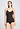 Front view of a women model wearing HA dark mocha cotton Padded Spaghetti Top