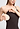 Close-up view of a women model wearing HA dark mocha cotton Padded Spaghetti Top