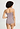 Back view of a women model wearing HA stormy rose cotton Spaghetti Top