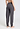 Back view of a women model wearing HA dark sesame cotton Long Pants