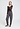 Full-body view of a women model wearing HA dark sesame cotton Long Pants