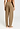 Back view of a women model wearing HA desert clay cotton Long Pants