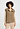 Front view of a women model wearing HA suede camel cotton Zippered vest