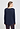 Back view of a women model wearing HA deep navy cotton L/SLV Shirt