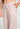 Close-up view of a women model wearing HA rose check cotton Long Pants
