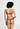 Back view of a women model wearing HA apple butter microfibre Soft Cup Bra