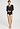 Full-body view of a women model wearing HA phantom wool L/SLV Shirt
