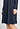 Close-up view of a women model wearing HA deep navy cotton L/SLV Nightdress 100cm
