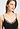 Close-up view of a women model wearing HA black cotton Spaghetti Top