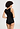 Back view of a women model wearing HA black cotton Tank Top