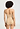 Back view of a women model wearing HA beige microfibre Soft Bra Bodysuit