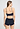Back view of a women model wearing HA deep navy microfibre Crop Top