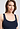 Close-up view of a women model wearing HA deep navy microfibre Tank Top