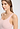 Close-up view of a women model wearing HA rosewater microfibre Tank Top