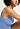 Close-up view of a women model wearing HA bluebird microfibre Tank Top