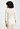 Back view of a women model wearing HA misty white wool 3/4 SLV Shirt