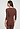 Back view of a women model wearing HA cinnamon wool 3/4 SLV Shirt
