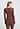 Back view of a women model wearing HA cinnamon wool L/SLV Shirt