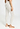 Back view of a women model wearing HA misty white wool Leggings