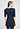 Back view of a women model wearing HA deep navy wool S/SLV Shirt