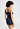 Back view of a women model wearing HA deep navy wool Spaghetti Top