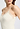 Close-up view of a women model wearing HA misty white wool Spaghetti Top