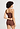Back view of a women model wearing HA cinnamon wool Spaghetti Top