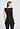 Back view of a women model wearing HA black wool Tank Top