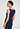 Back view of a women model wearing HA deep navy wool Tank Top