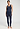Full-body view of a women model wearing HA deep navy wool Tank Top