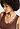 Close-up view of a women model wearing HA cinnamon wool Tank Top