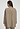 Back view of a women model wearing HA earthy woven cotton Blouse
