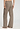 Back view of a women model wearing HA earthy woven cotton Long Pants
