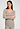Front view of a women model wearing HA rose grey wool L/SLV Shirt