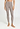 Front view of a women model wearing HA rose grey wool Leggings