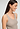 Close-up view of a women model wearing HA rose grey wool Tank Top
