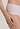 Close-up view of a women model wearing HA white cotton Maxi Briefs